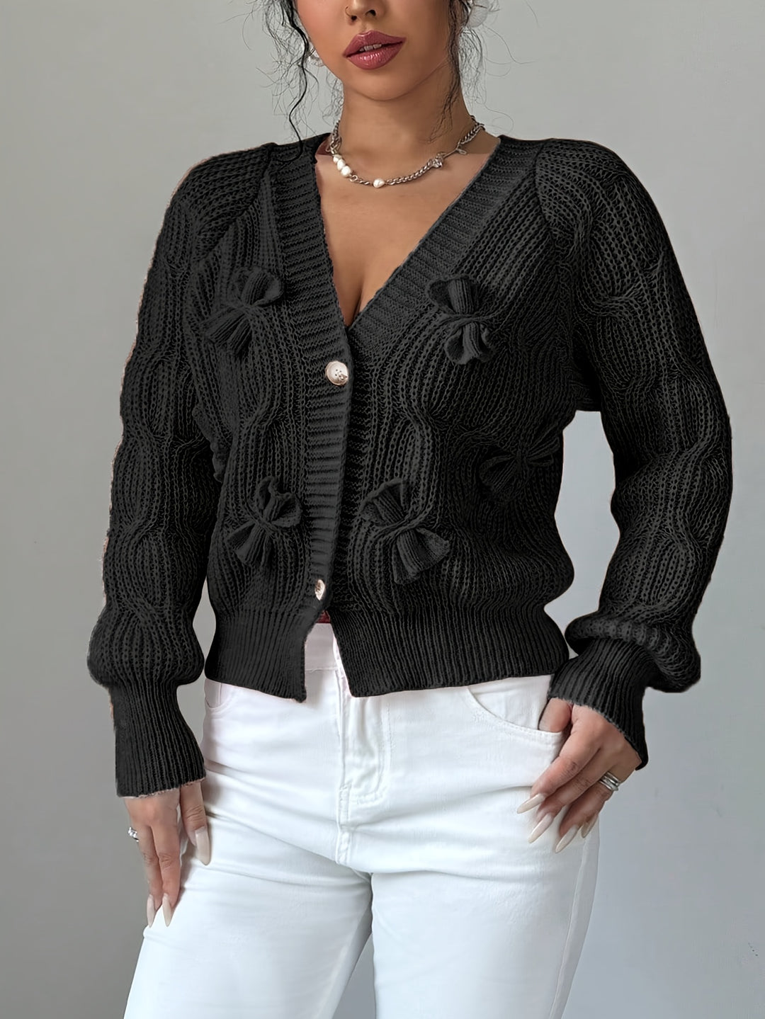 Editha | Zarte Schleifen-Strickjacke