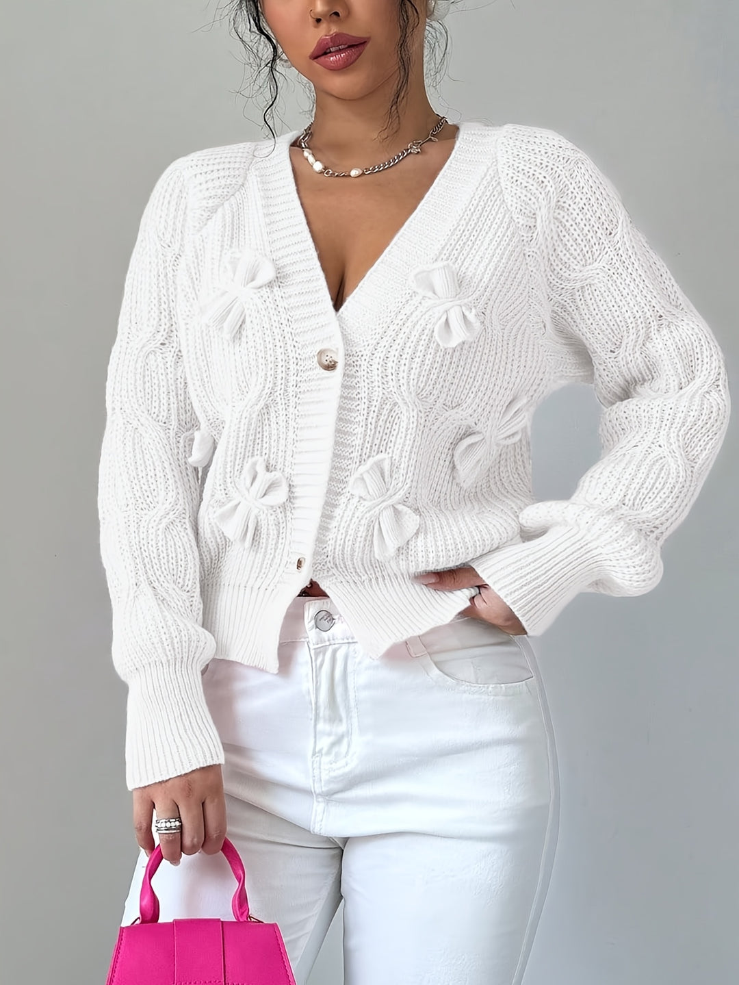 Editha | Zarte Schleifen-Strickjacke