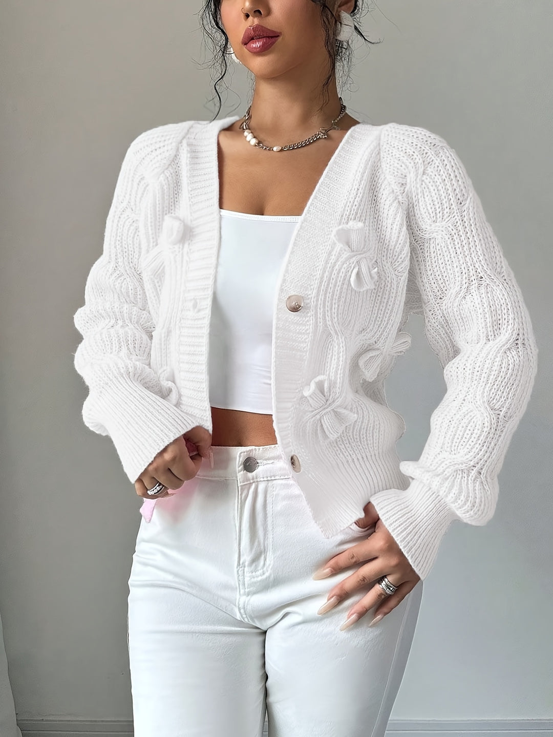 Editha | Zarte Schleifen-Strickjacke
